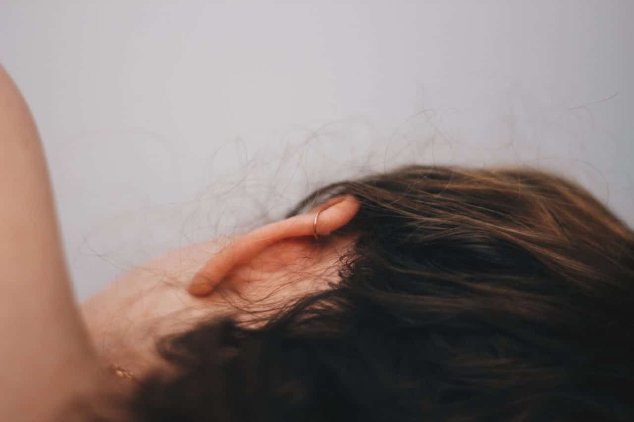 Close-up of a woman's ear.