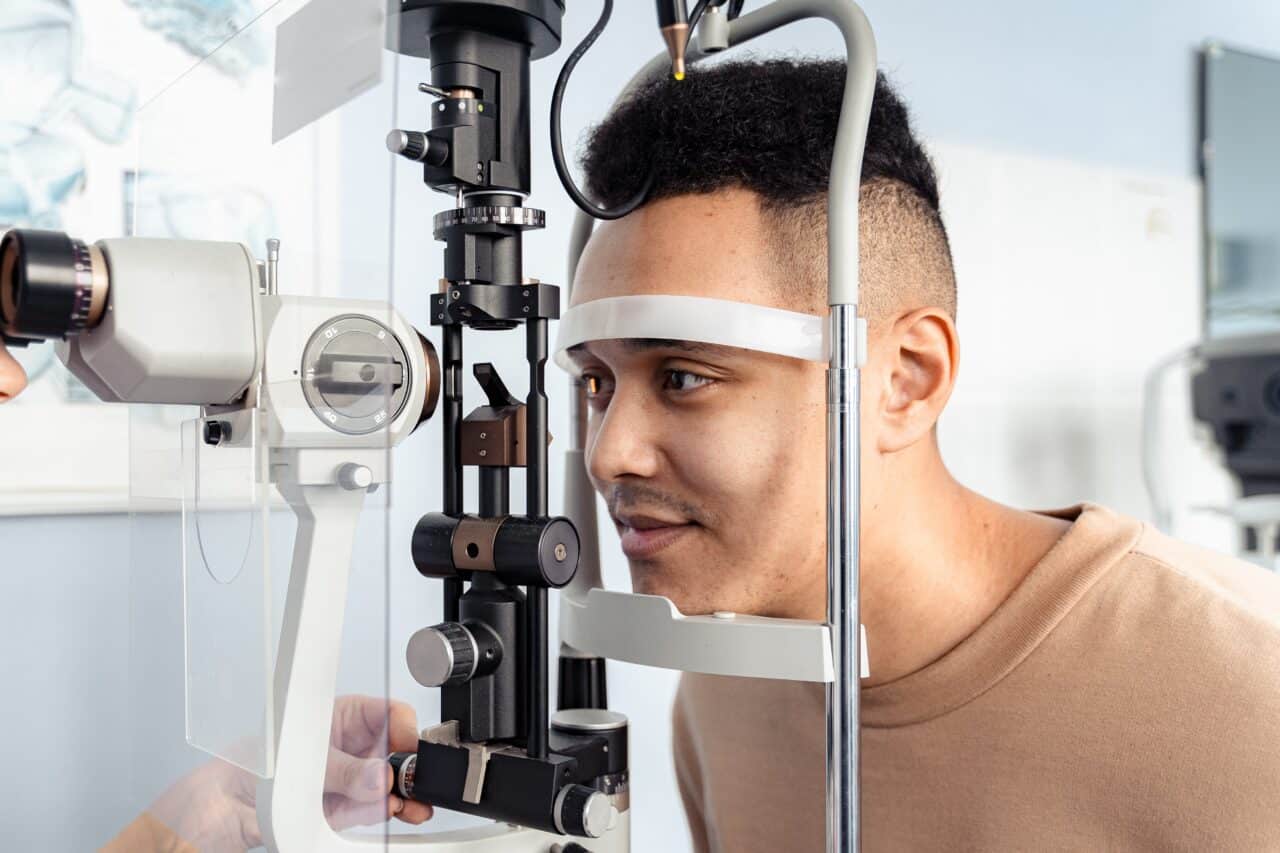 Man receiving an eye exam to detect glaucoma.